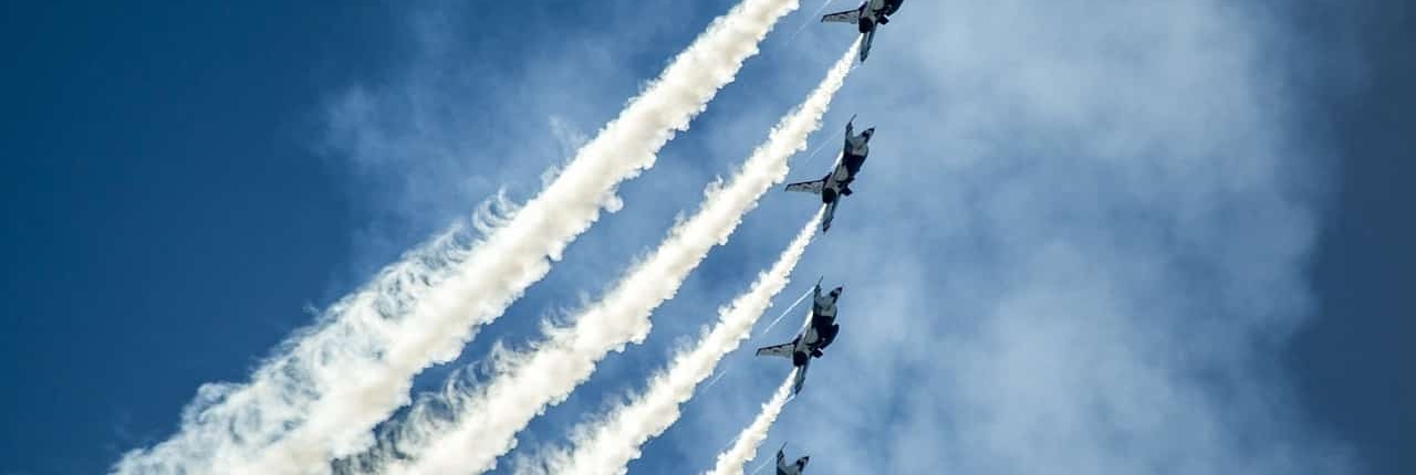 Five fighter jets during an airshow