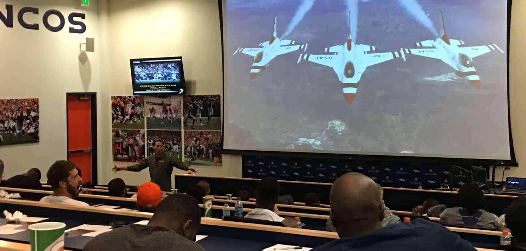 Afterburner presentation deck with clients watching