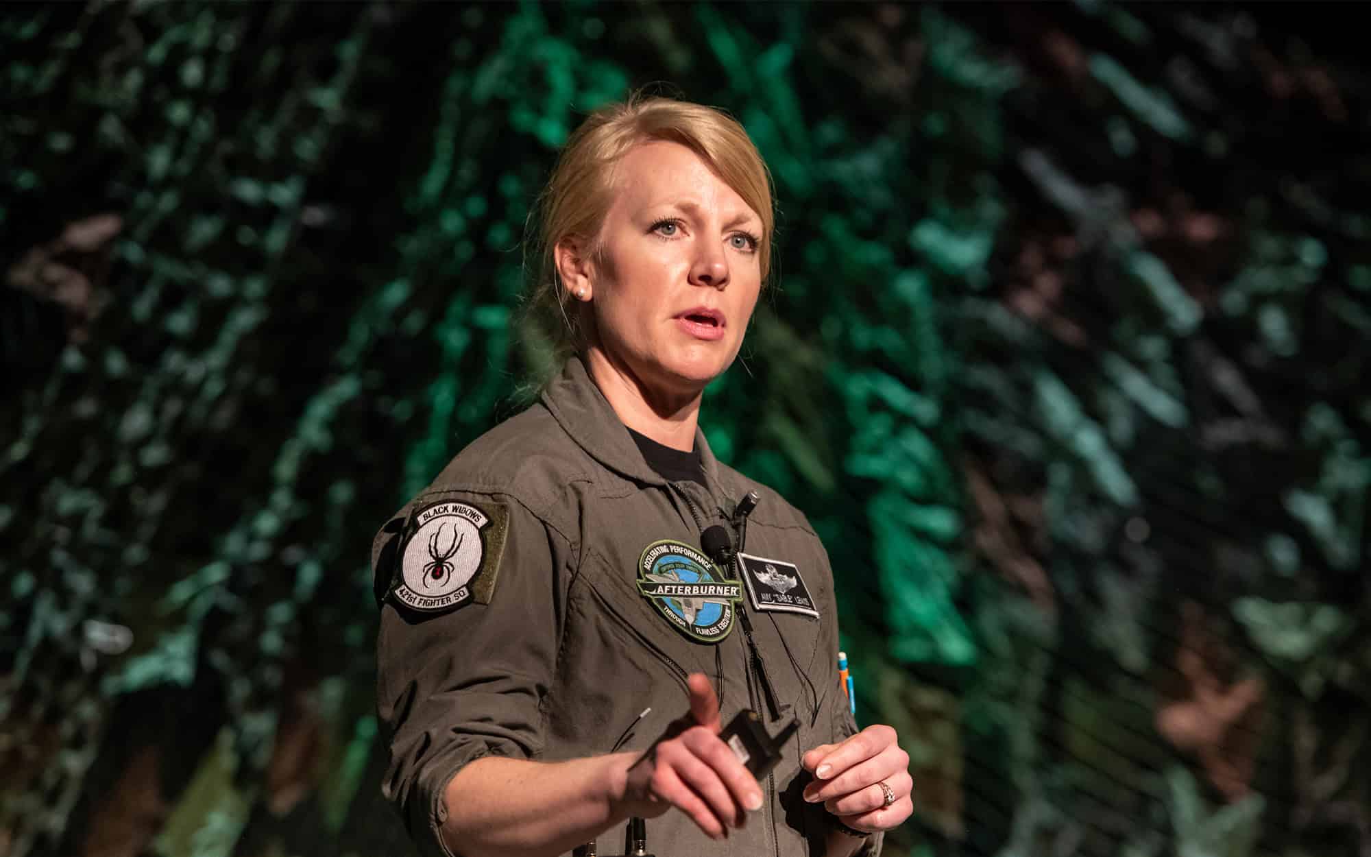 Close Up Of Female Speaker On Stage At Keynote