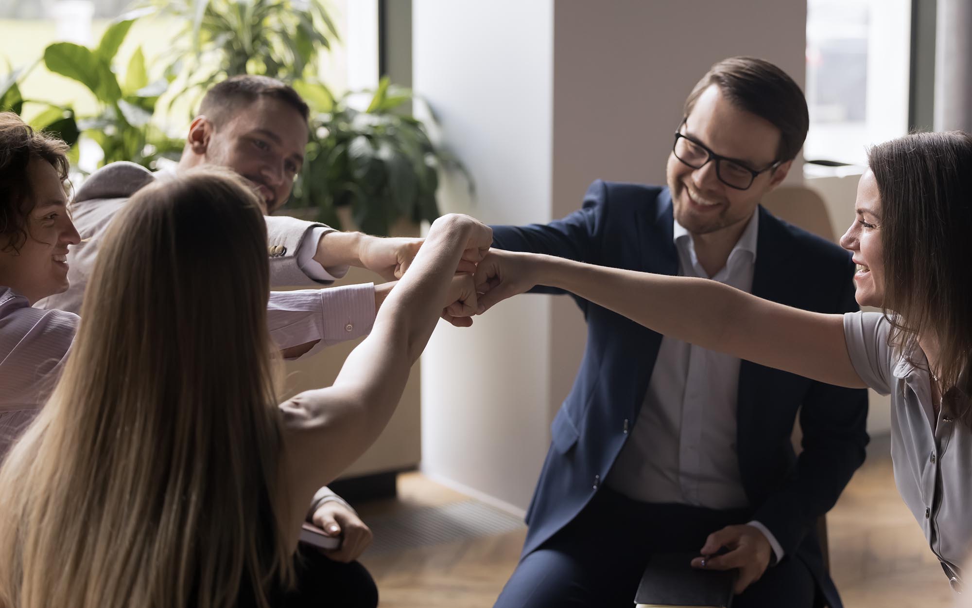 Business People Putting Hands Together