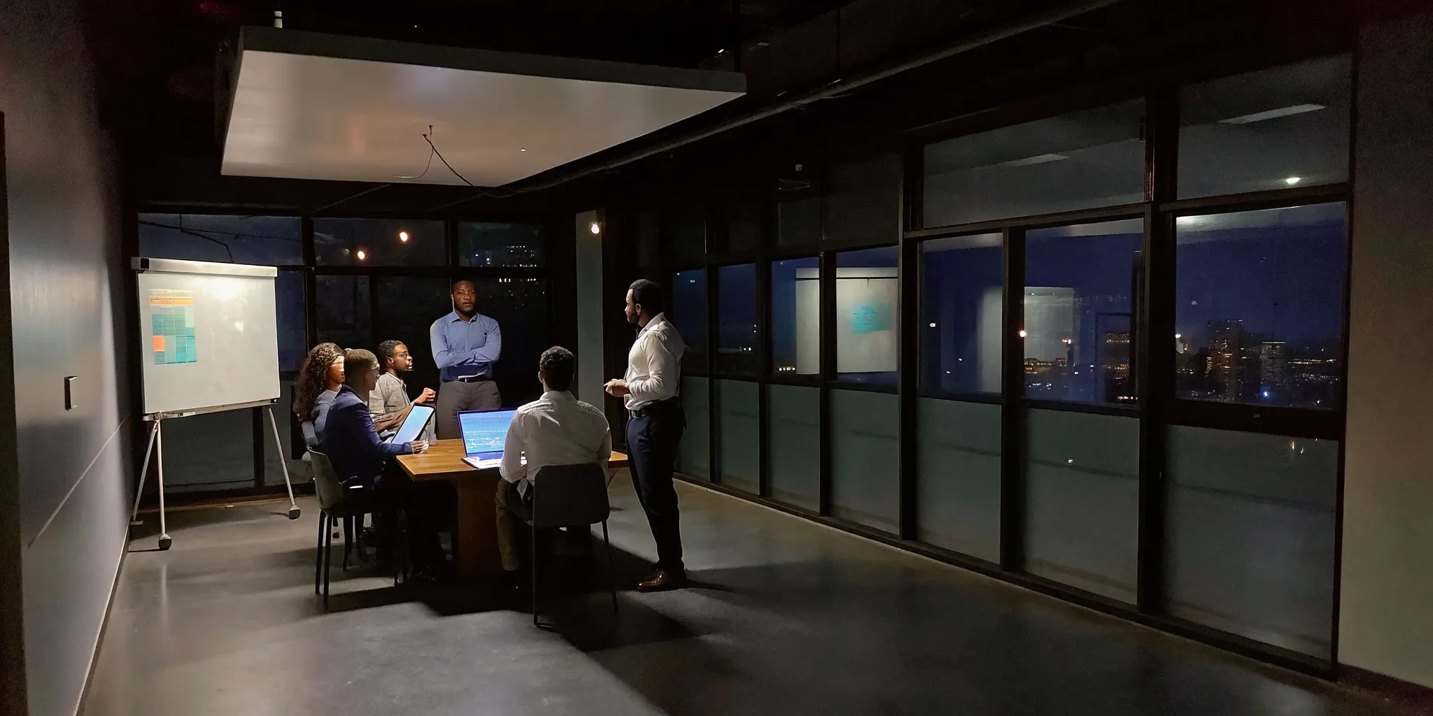 A team engaged in a corporate leadership training workshop to drive business results.